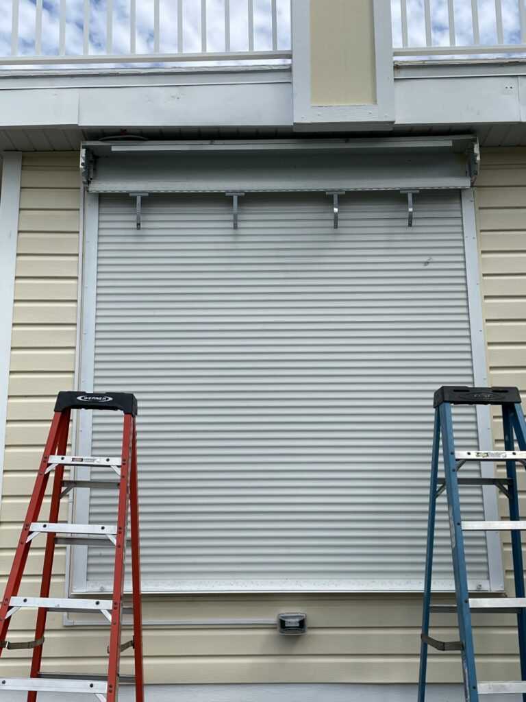 manual roll down hurricane shutter repair