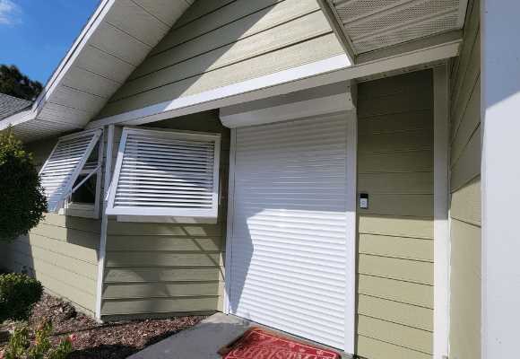 manual roll down hurricane shutter repair